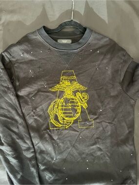 AMIRI Black Crewneck Sweatshirt with Yellow Emblem Graphic